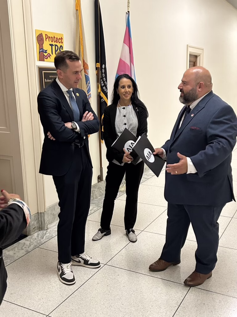 Manuel is talking with Congressman Rob Menendez. 8th District New Jersey 